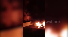French riot police patrol the streets of Strasbourg as firefighters tackle vehicle fires after unrest