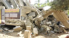 Palestinian children of Nabhan family play on the rubble of their house,  on the second day of the Muslim feast of Eid al-Adha