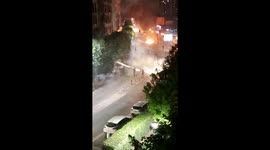 Dramatic footage shows police car retreat as French rioters unleash barrage of fireworks
