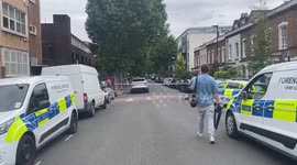 Forensics on scene of double murder in London's Archway