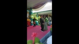 Unforgettable graduation moment as boy mistakes canvas for Wall and takes a tumble