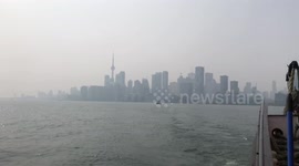 Wildfire smoke over the Toronto city skyline - worst air in the world