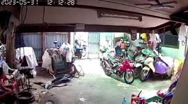 Quick-thinking lad runs and catches favourite motorbike before it falls to ground