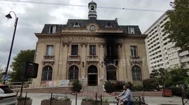 Riots across France after the death of a young driver Nahel killed by the Police in Nanterre. Here the city hall of L'Île-Saint-Denis destroyed by fire. Paris suburb. (Video): 1 july 2023.