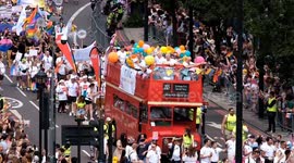 Birds-eye view of Pride in London crowd as they fill the capital in colour