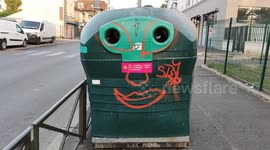 Pareidolia in Paris suburb. Bottle bank face. Villejuif, France. 2 july 2023