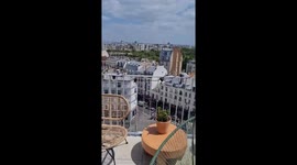 Paris rooftop panorama view from balcony (sight on the Pantheon and the Duo Towers). France. 2 july 2023.