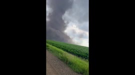 Narrow Escape: Driver flees from oncoming tornado in Alberta, Canada