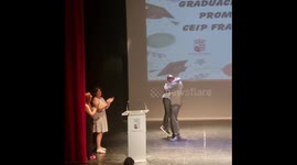 Father surprises son on graduation day after two years apart