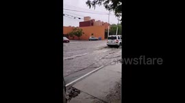 Mexico: Floodwater Flows Down Road After Heavy Rain In Queretaro