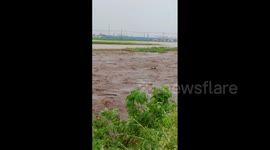 Flooding hits Japan's Kyushu region as torrential rain continues