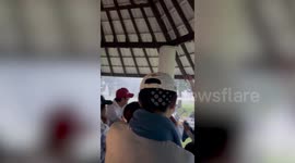 Lightning strike jolts golfers sheltering from monsoon storm in the Philippines