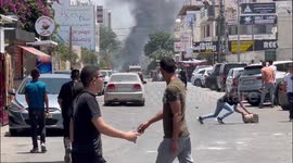 Palestinians throw stones at military vehicles and start fires to protest deadly Israeli operation