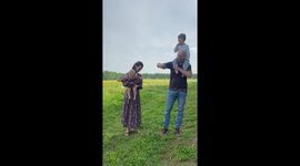 Family Photoshoot With a Brown Bear