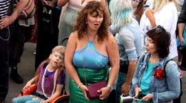 March of the Mermaids, Brighton 2023: a parade of people in costume highlighting the need to look after our oceans