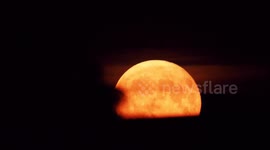 Stunning full Buck Supermoon seen rising above Kent, UK
