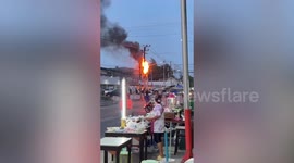 Power cables burst into flame in front of hospital in Thailand