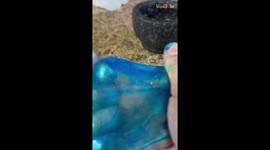 Slime lover engulfs the 'clear blue ocean' fanatics in a squishy spectacle