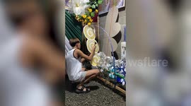 Doting son handcrafts queen-themed dress for mum's religious pageant