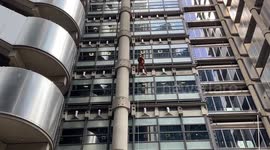 People abseil down the Lloyd’s Building for charity