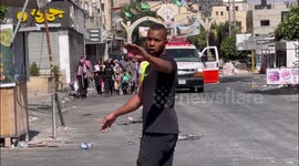 Residents leave Jenin refugee camp in the West Bank as Israeli forces' raid continues