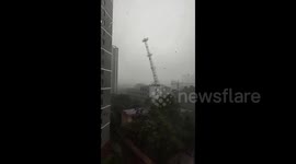 Telecom tower collapses in devastating winds and rain in China