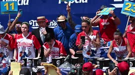 Hundreds flock to cheer on Nathan's hot dog eating contest on Independence Day