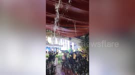 Rain pours through graduation ceremony in the Philippines