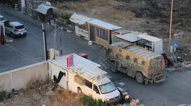 Palestinians shelter inside hospital as Israeli military vehicles drive through Jenin