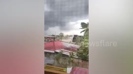 Tornado sweeps up debris as it blitzes through neighbourhood in the Philippines