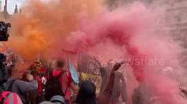 Flares set off as thousands of striking teachers march through Westminster