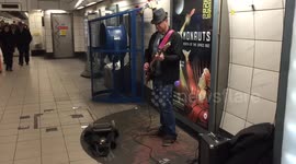 Amazing busker covers Sultans of Swing at Bank Station, London