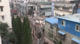 Three-storey building collapses in China