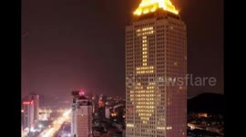 84-year-old man rents outer wall of skyscraper hotel to tell his wife he loves her