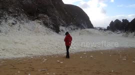 DUPLICATE Impressive amounts of sea foam off the coast of France