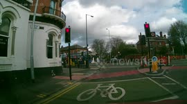 Van knocks over cyclist in Manchester