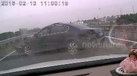 Car driver spits out the window, causing a crash