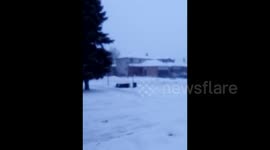 Woman walks to winter BBQ during major blizzard and talks us through the journey