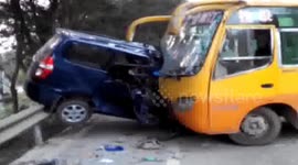Coach crashes bus on bridge
