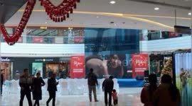 News report from China of porn being played on big screen in mall