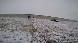 Sledding and Crashing Into a Tree