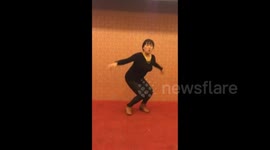 Woman dances to ridiculous chicken song