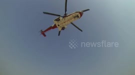 Police helicopter rescues family trapped on sea ice