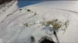 Snowmobile rider thrown off by hidden rocks