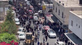 Mourners carry bodies of Palestinians killed in clashes the previous day in the Israeli military operation during the funeral in Jenin in the West Bank
