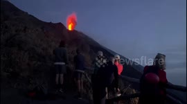Tourists watch as Mount Stromboli erupted in Italy