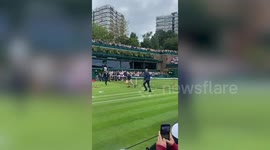Play suspended as Just Stop Oil protester throws confetti during Katie Boulter's match