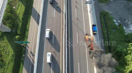 Drone video The car caught fire on the fly over toll road and created a traffic jam that was so long that the police arrived