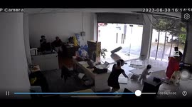 Truck tire speeding into shop narrowly misses two children in China