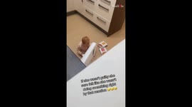 Prankish dad freaks 1 y/o daughter out by sneaking up on her in the kitchen